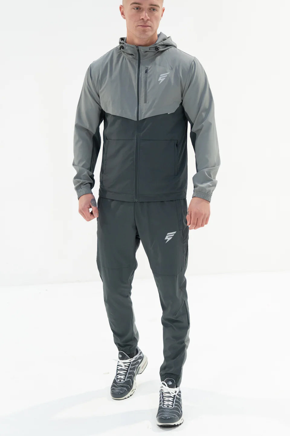 Elude track pants 'coal/light grey'
