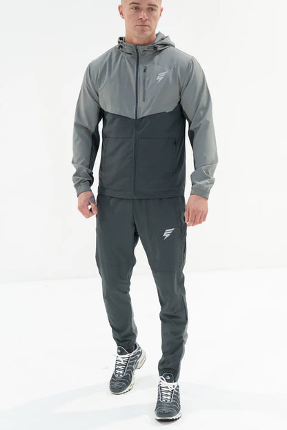 Elude track pants 'coal/light grey'