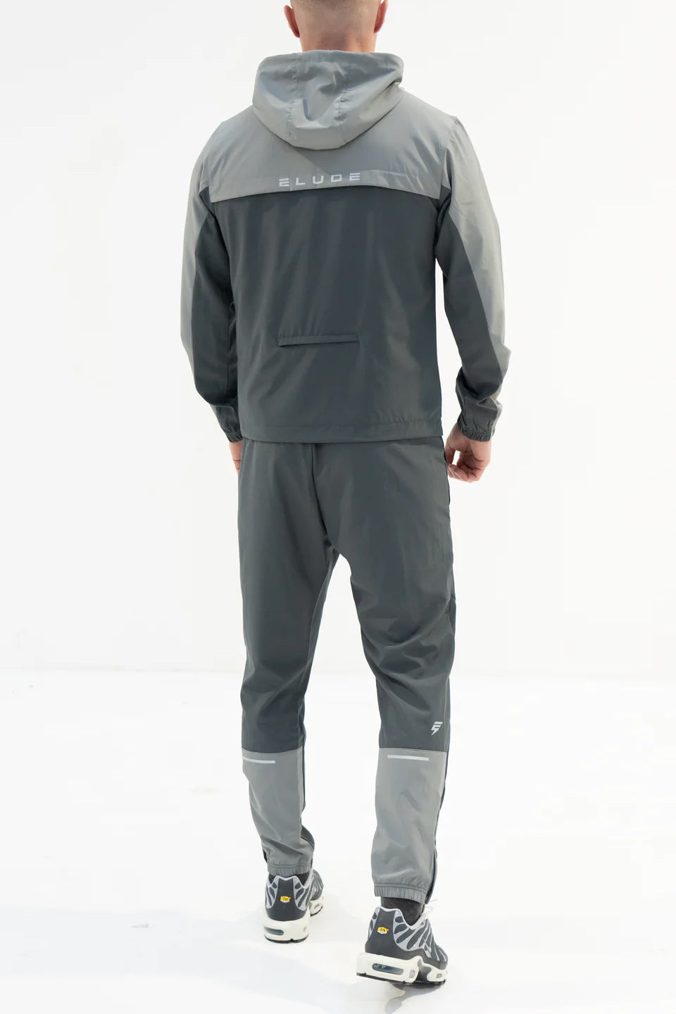 Elude track pants 'coal/light grey'